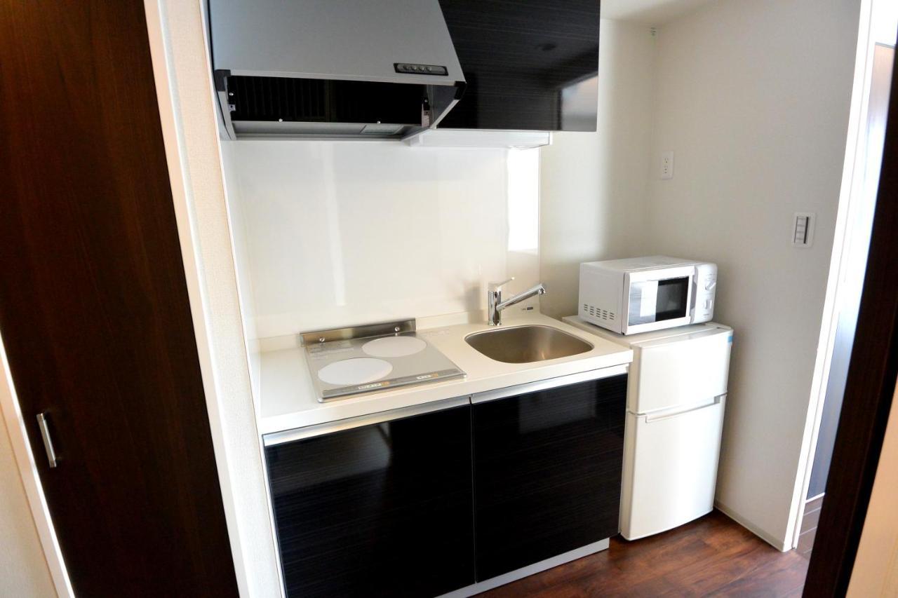 Ferienwohnung オリエントシティ南堀江ⅱl Ōsaka Exterior foto
