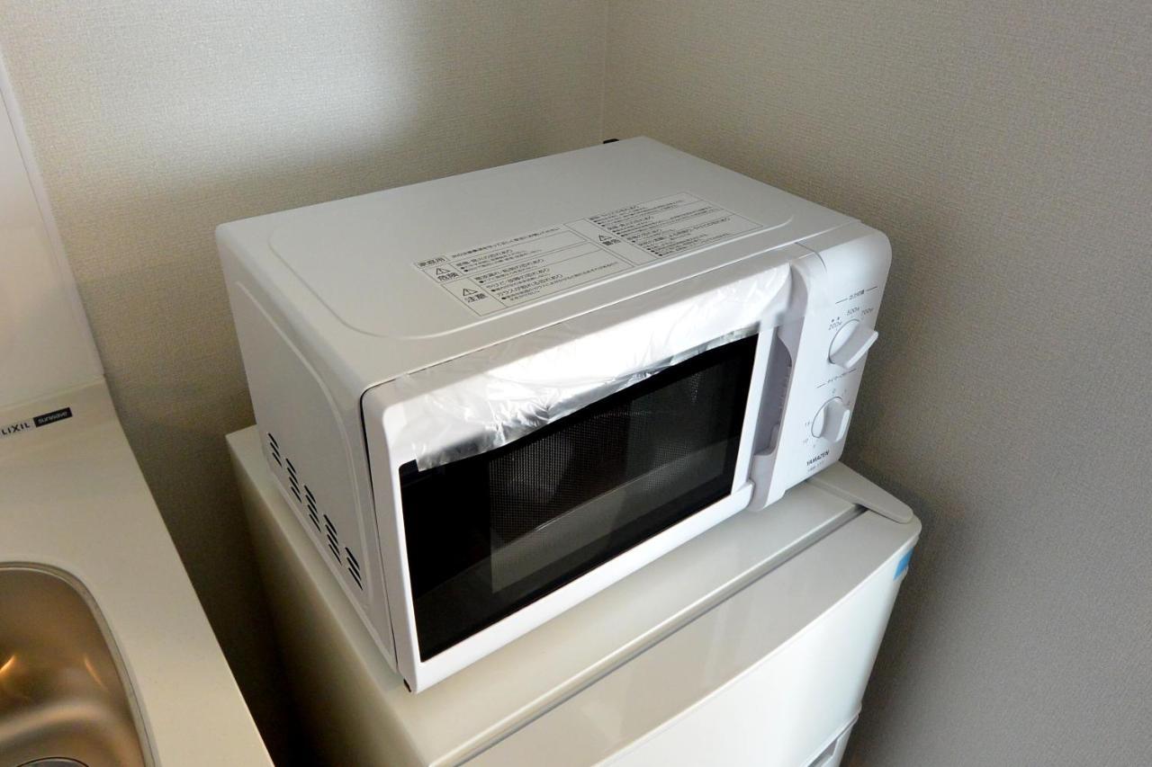 Ferienwohnung オリエントシティ南堀江ⅱl Ōsaka Exterior foto